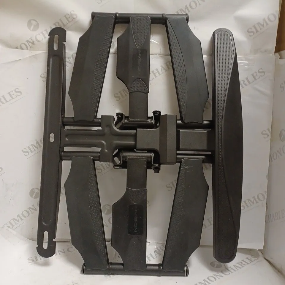 BOXED INVISION TV MOUNT FOR WALL. 