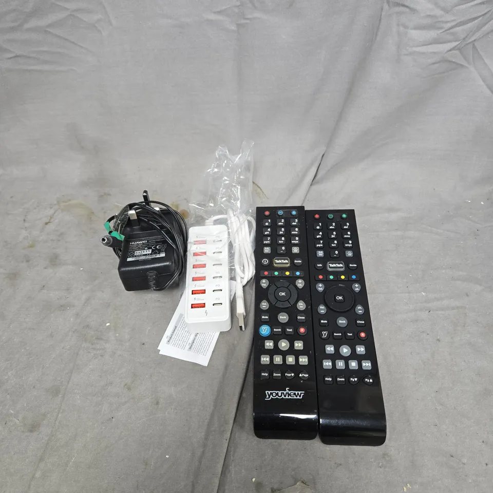APPROXIMATELY 10 ASSORTED HOUSEHOLD ITEMS TO INCLUDE REMOTE CONTROLS, POWER SUPPLIES, POWER ADAPTERS ETC