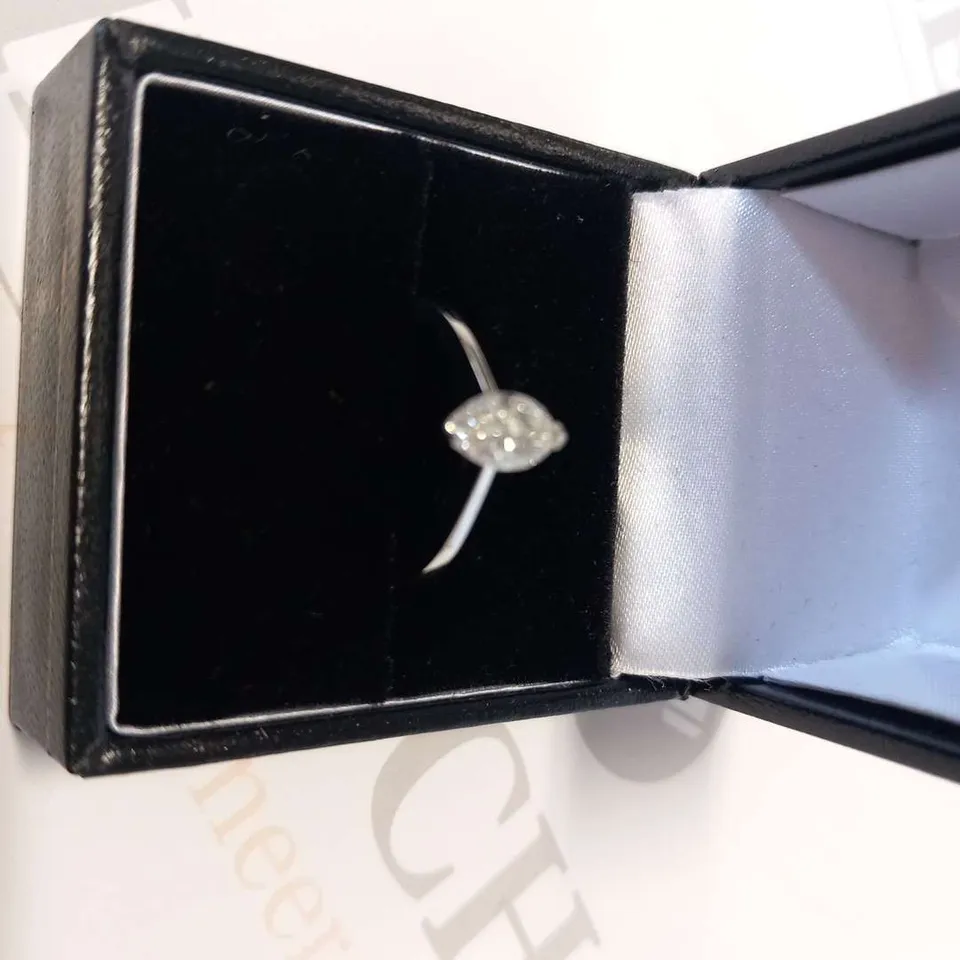 18CT WHITE GOLD SOLITAIRE RING SET WITH A NATURAL MARQUISE CUT DIAMOND WEIGHING, +0.80CT