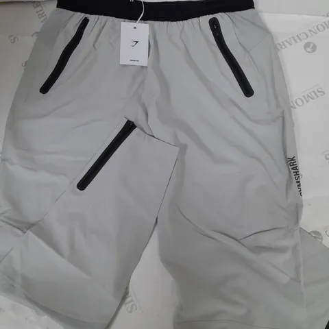 GYMSHARK HYBRID WOVEN PANTS IN LIGHT GREY - L