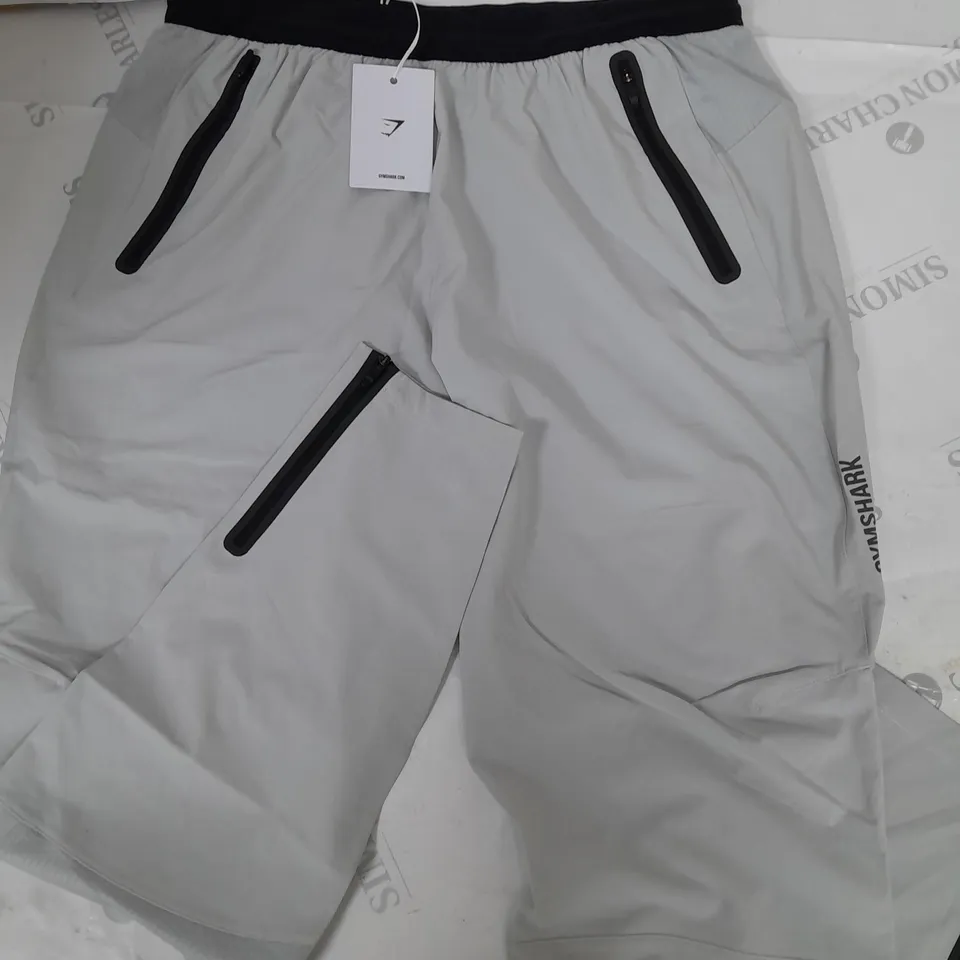 GYMSHARK HYBRID WOVEN PANTS IN LIGHT GREY - L