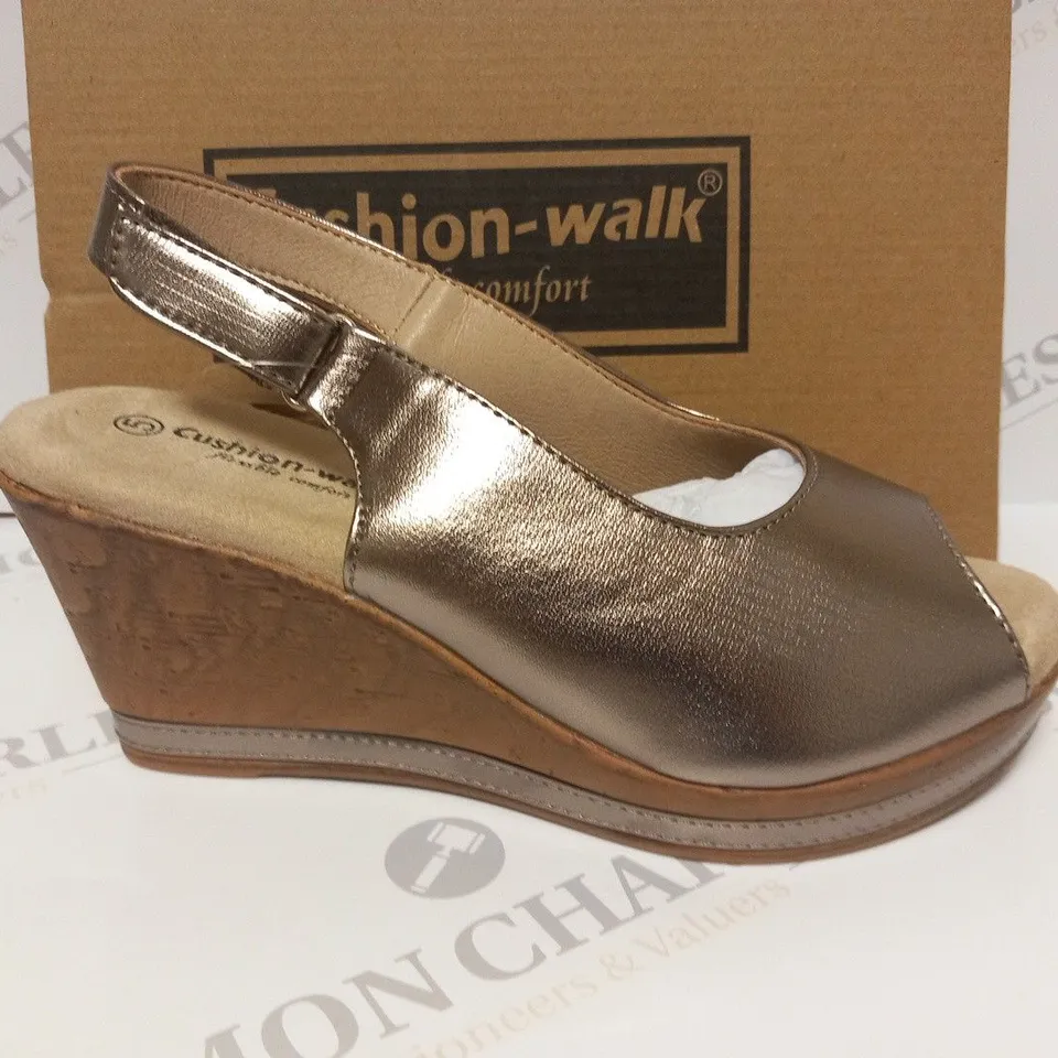 BOXED PAIR OF CUSHION WALK WEDGE HEEL SHOES IN GOLD - SIZE 5