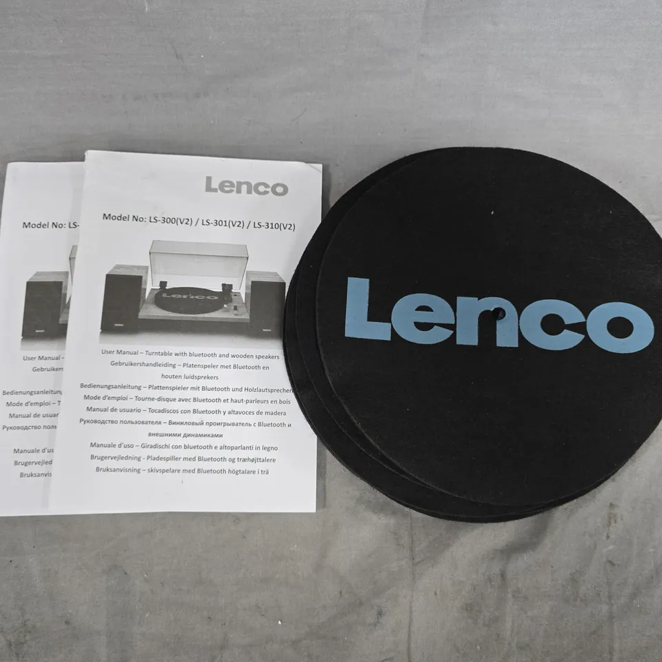 LARGE QUANTITY OF ASSORTED TURNTABLE MANUALS AND BRANDED FELT DISCS 
