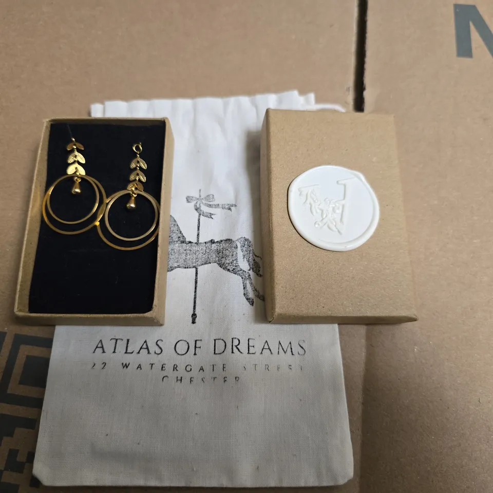 PAIR OF GOLD TONE TWIN HOOPED EARRINGS IN ATLAS OF DREAMS BRANDED PACKAGING