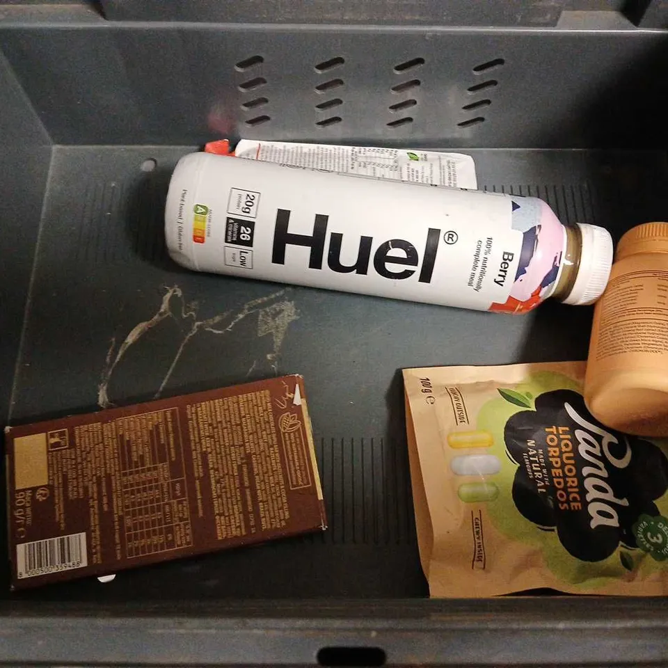 TOTE OF APPROX 10 ASSORTED FOOD ITEMS TO INCLUDE - HUEL BANANA , LAVAZZA COFFEE BEAN , CHOCOLATE PEANUTS ETC