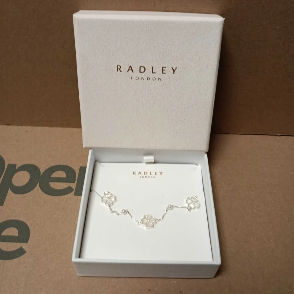 RADLEY LONDON BRACELET – SILVER-TONE WITH FLORAL CHARM MOTIFS (BOXED)