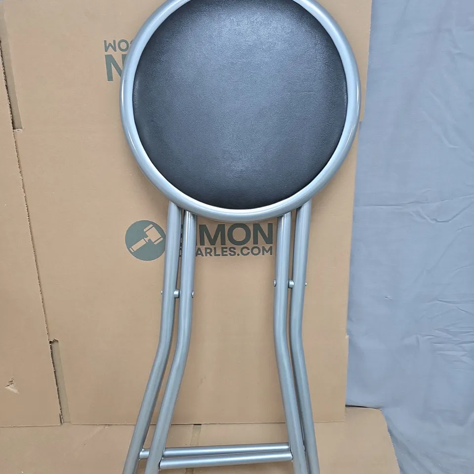 CAGE OF ASSORTED CONSUMER PRODUCTS/FURNITURE PARTS INCLUDING:  SMALL STOOL, GARMENT STEAMER AND HOT WATER URN ECT // CAGE NOT INCLUDED 