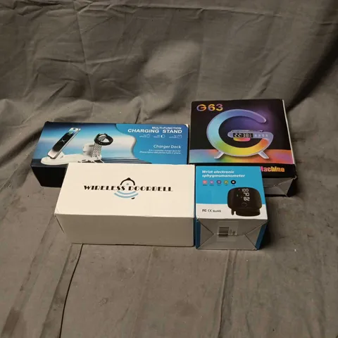 APPROXIMATELY 25 ASSORTED HOUSEHOLD ITEMS TO INCLUDE SMART LIGHT SOUND MACHINE, WIRELESS DOORBELL, CHARGING STAND, WRIST SPHYGMOMANOMETER ETC