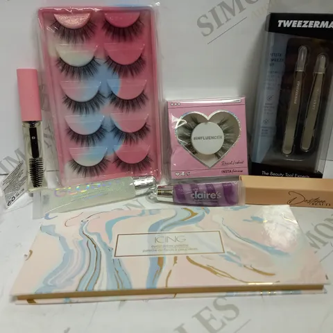 LOT OF APPROX 6 TO INCLUDE LASHES , TWEEZERS , LIPGLOSS , ETC 