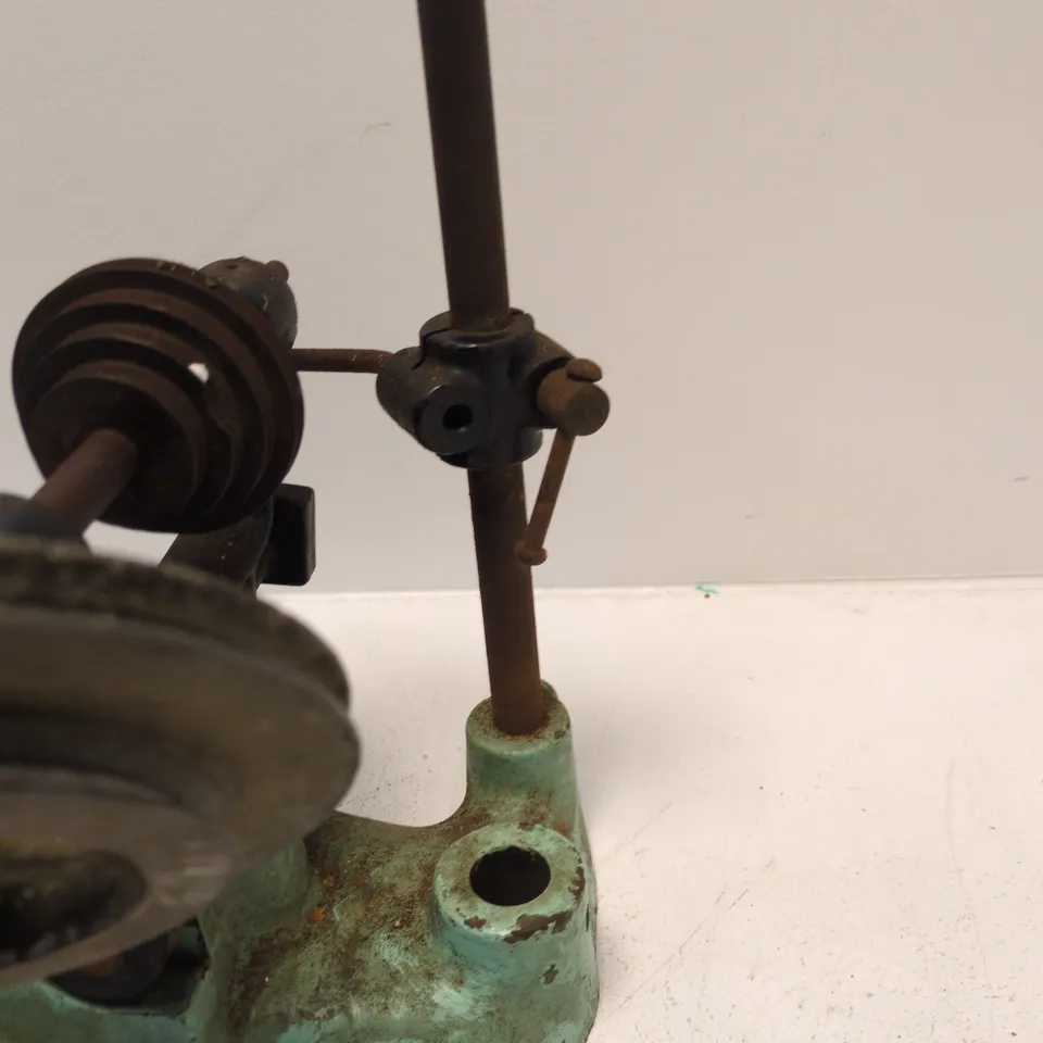 VINTAGE HAND-CRANKED WORKSHOP TOOL WITH FLYWHEEL, GREEN BASE