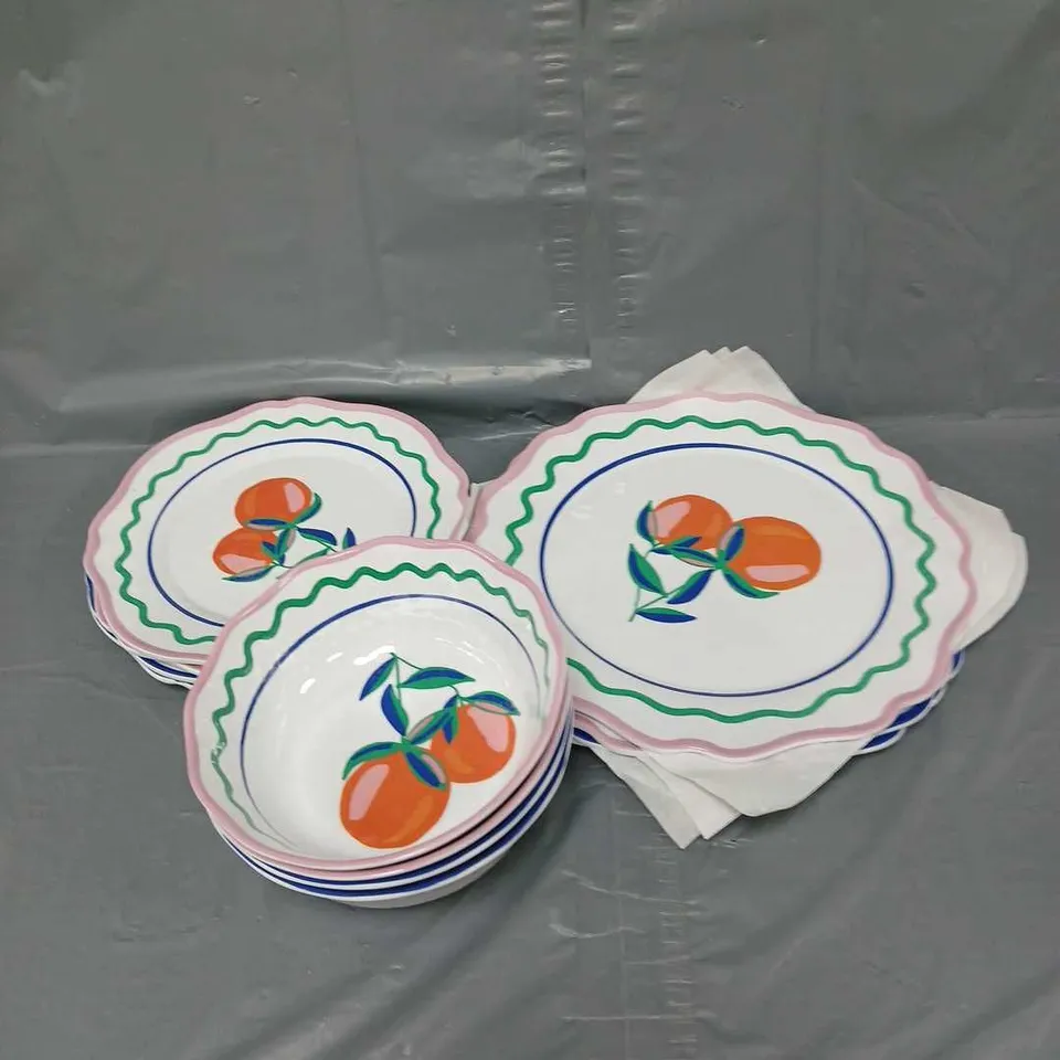 PLASTIC 12PCE DINNER SET IN ORANGE MULTI