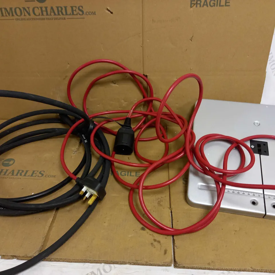 BOX OF APPROX 10 ITEMS TO INCLUDE A METAL TABLE JIG, VOLEX 16A OUTDOOR POWER OUTLET, HOSE FOR AIR PUMP 2900PSI MAX