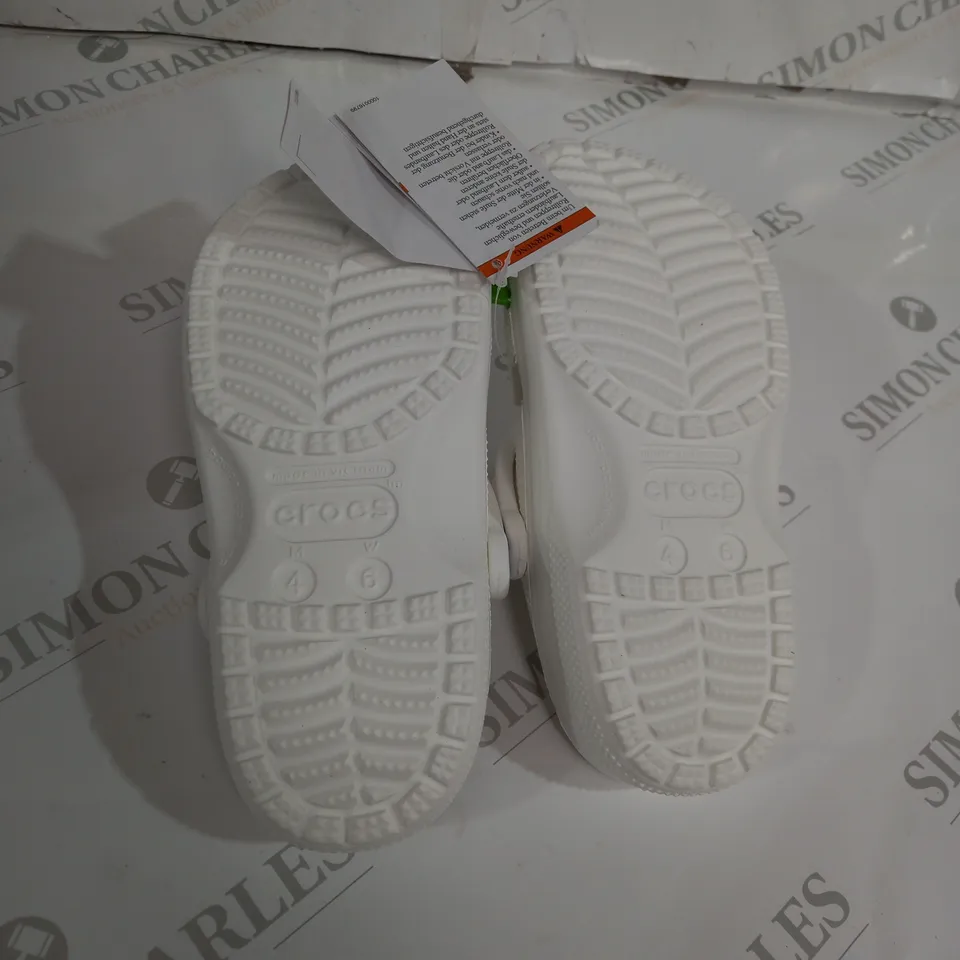 PAIR OF WHITE CROCS SIZE W6 M4