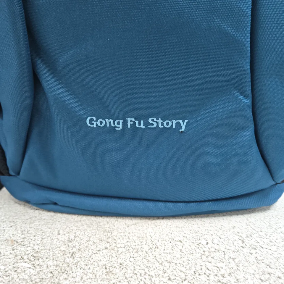 BLUE RUCKSACK WITH GONG FU STORY LOGO AND MEI-LEAF BADGE 