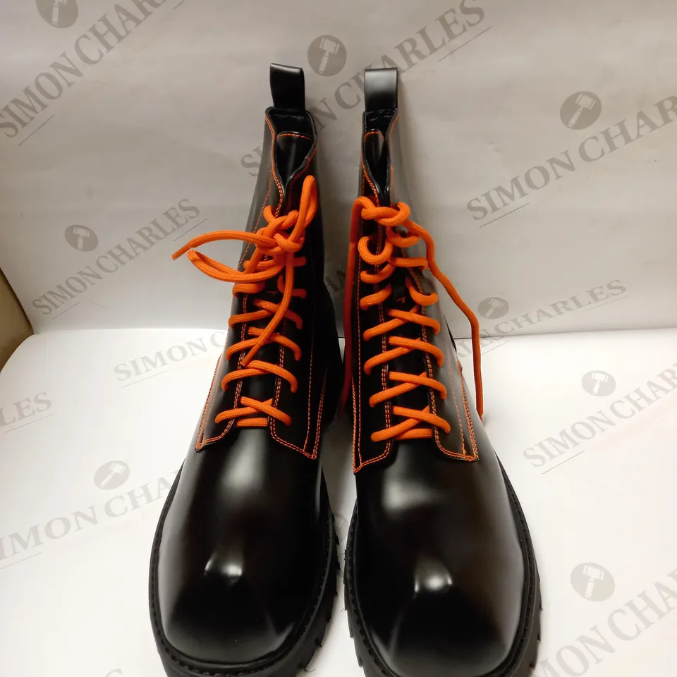 DESIGNER KOI VEGAN BOZO ORANGE AND BLACK FORK TOE BOOTS SIZE 6