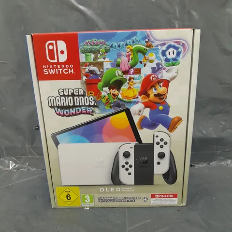 BOXED SEALED NINTENDO SWITCH OLED CONSOLE & SUPER MARIO BROS. WONDER