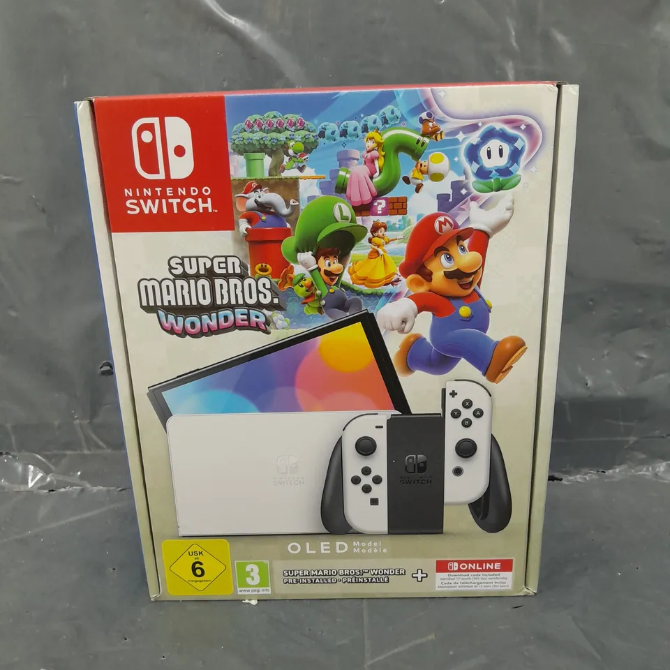 BOXED SEALED NINTENDO SWITCH OLED CONSOLE & SUPER MARIO BROS. WONDER