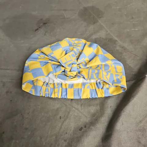 SILK & LAWN LADIES TURBAN HAT IN LIBERY OF LONDON YELLOW LETTERS SIZE UNSPECIFIED