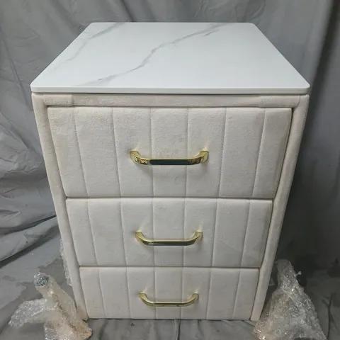 WHITE PADDED FABRIC 3-DRAWER BEDSIDE CABINET WITH MARBLE-EFFECT TOP AND LEGS