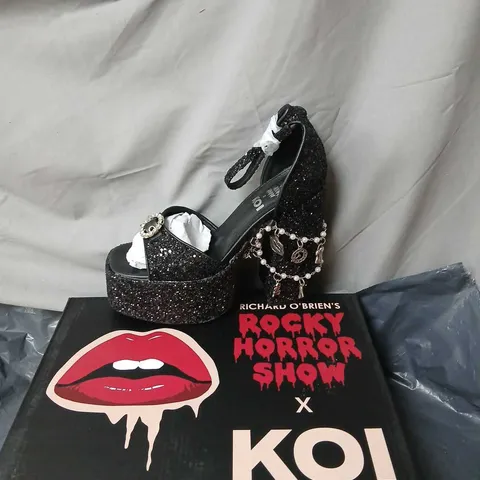 RICHARD O'BRIEN'S ROCKY HORROR SHOW X KOI FRANK N FURTER CHARM HEELS - BLACK GLITTER, UK5 