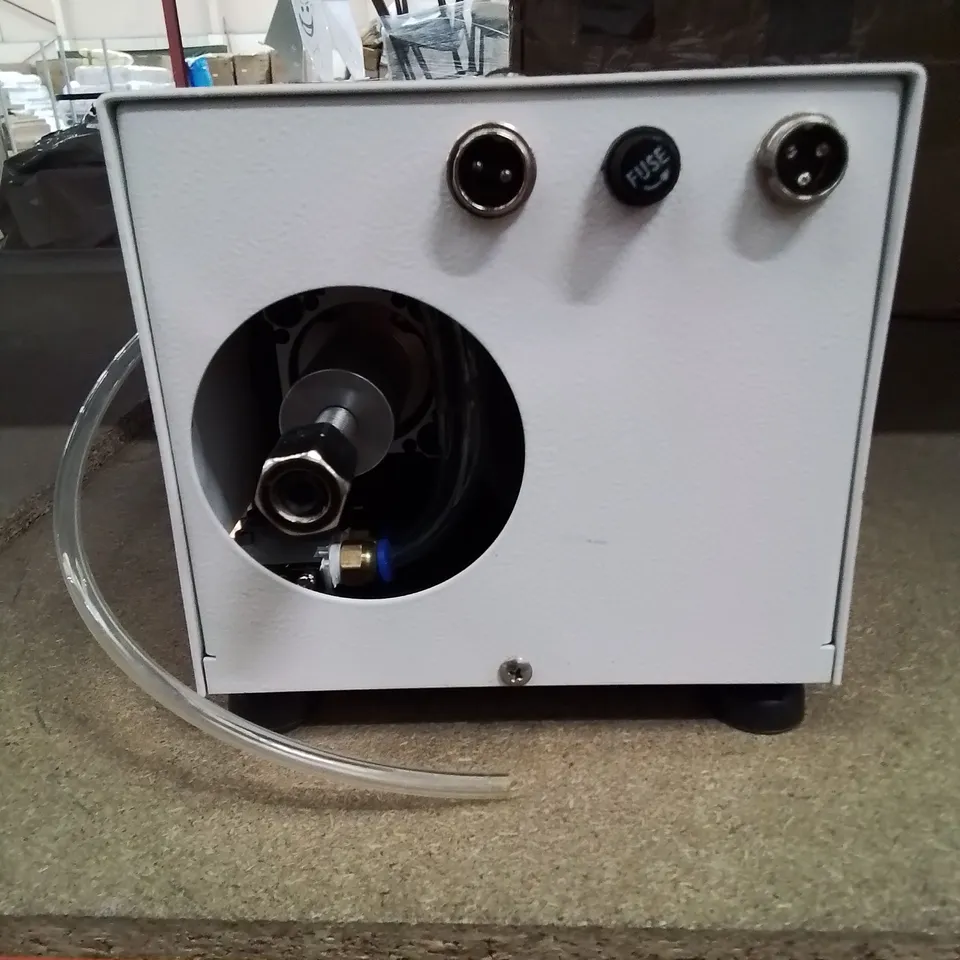 A BOXED WIRE STRIPPING AND TWISTING MACHINE 