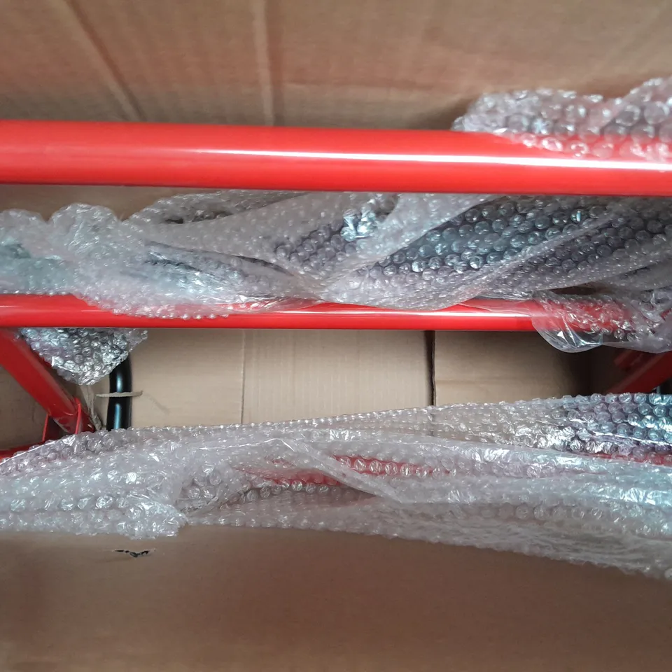 BOXED UNBRANDED FOLDING FOUR WHEEL ROLLATOR MOBILITY AID IN RED