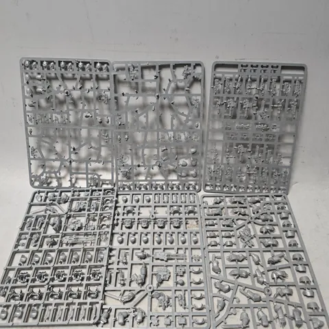 TOTE OF APPROXIMATELY 7 SHEETS OF WARHAMMER PLASTICS - MODEL UNSPECIFIED 