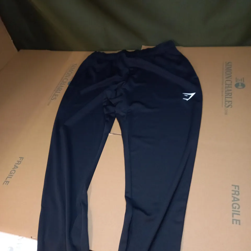 GYMSHARK TRACKIE BOTTOMS IN BLACK SIZE S