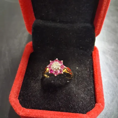 18CT YELLOW GOLD CLUSTER RING SET WITH RUBIES AND A NATURAL DIAMOND