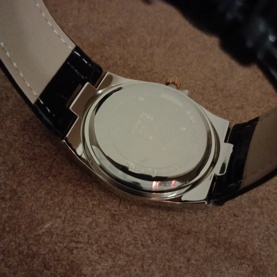 ERNEST FERDINAND QUARTZ WRISTWATCH – BLACK DIAL, ROSE GOLD COLOUR BEZEL, LEATHER STRAP