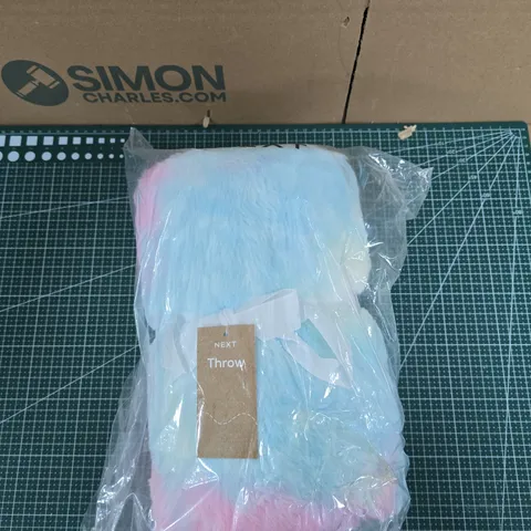 NEXT THROW BLANKET – PASTEL BLUE WITH PINK EDGES