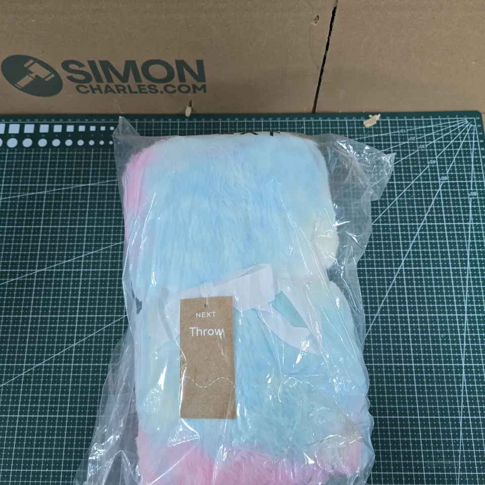 NEXT THROW BLANKET – PASTEL BLUE WITH PINK EDGES