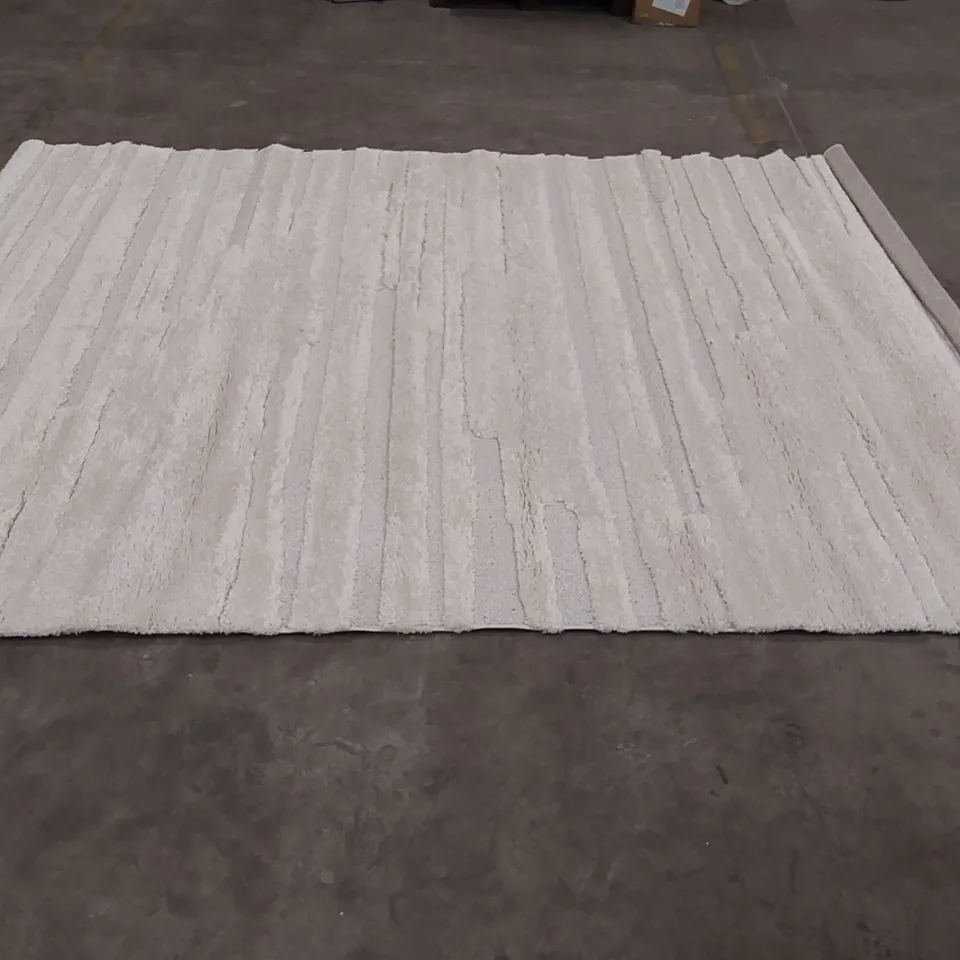 RECTANGULAR LANGSA UNIFORM COLOUR RUG - 7'7" X 10'10"