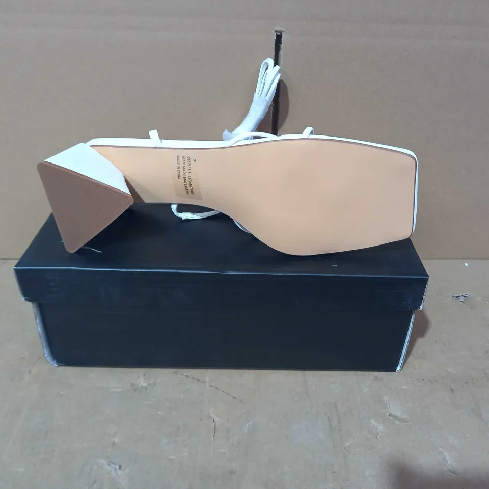 BOXED PAIR OF EGO HEELS IN WHITE UK SIZE 7