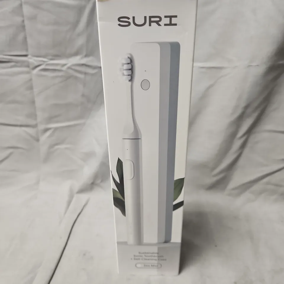 BOXED AND SEALED SURI SUSTAINABLE SONIC TOOTHBRUSH + SELF-CLEANING CASE – SEA MIST