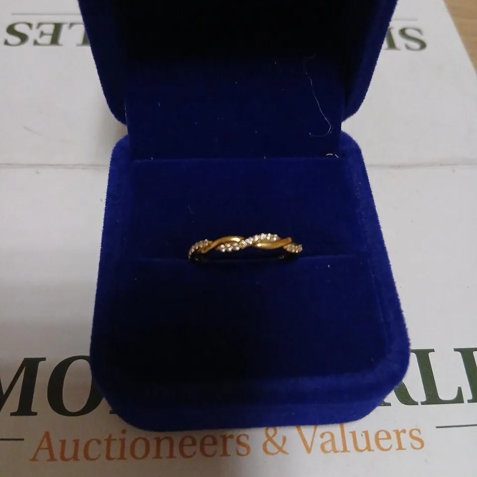 DIAMONIQUE GOLD-TONE RING WITH CLEAR STONES IN TWISTED DESIGN 