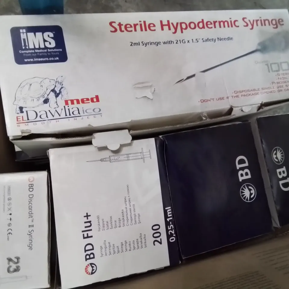 THREE CASES OF ASSORTED SYRINGES