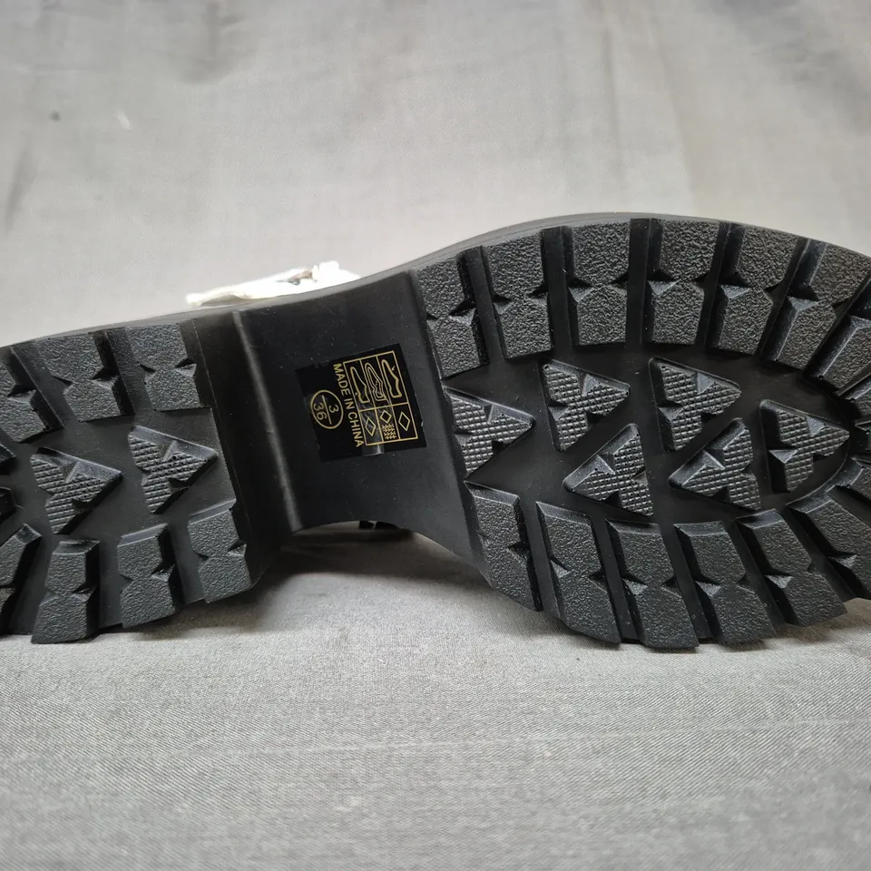 BOXED PAIR OF KOI SAI COW PRINT MARY JANES NETTIE EDITION IN BLACK/WHITE UK SIZE 3