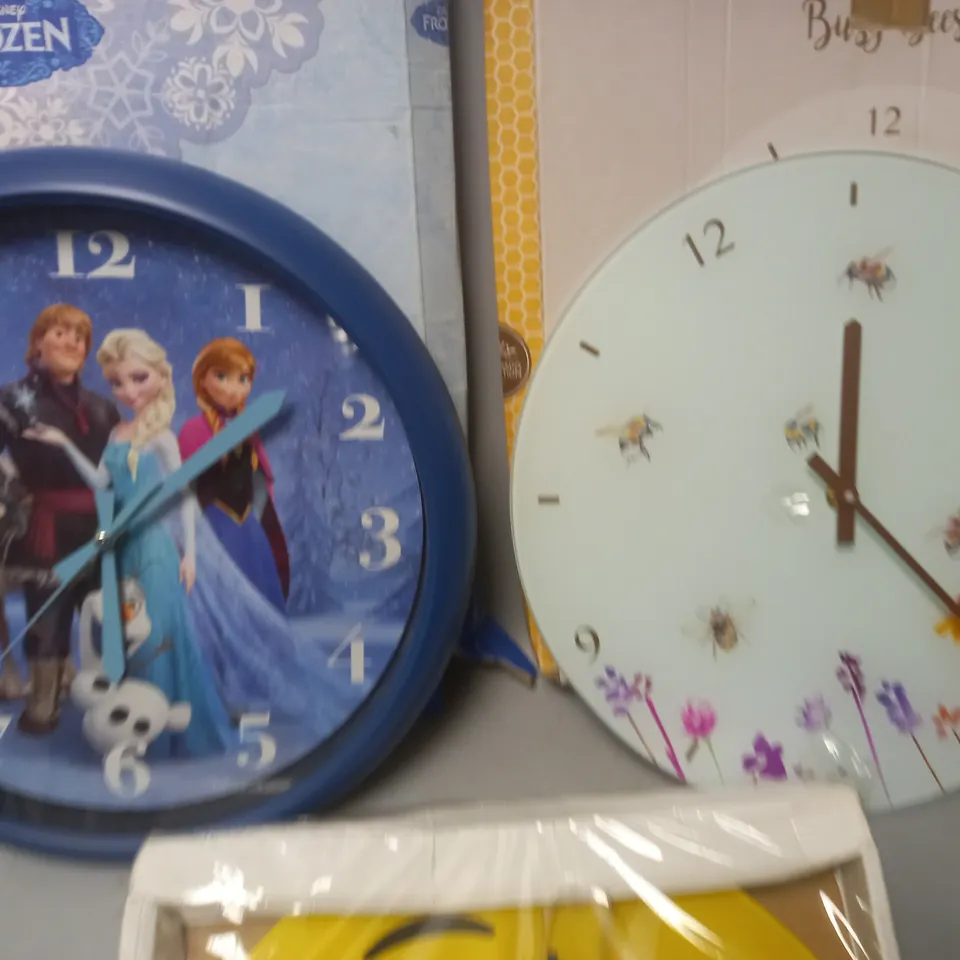 LOT OF 3 ASSORTED WALL CLOCKS INCLUDE SMILEY, FROZEN AND BEE THEMES