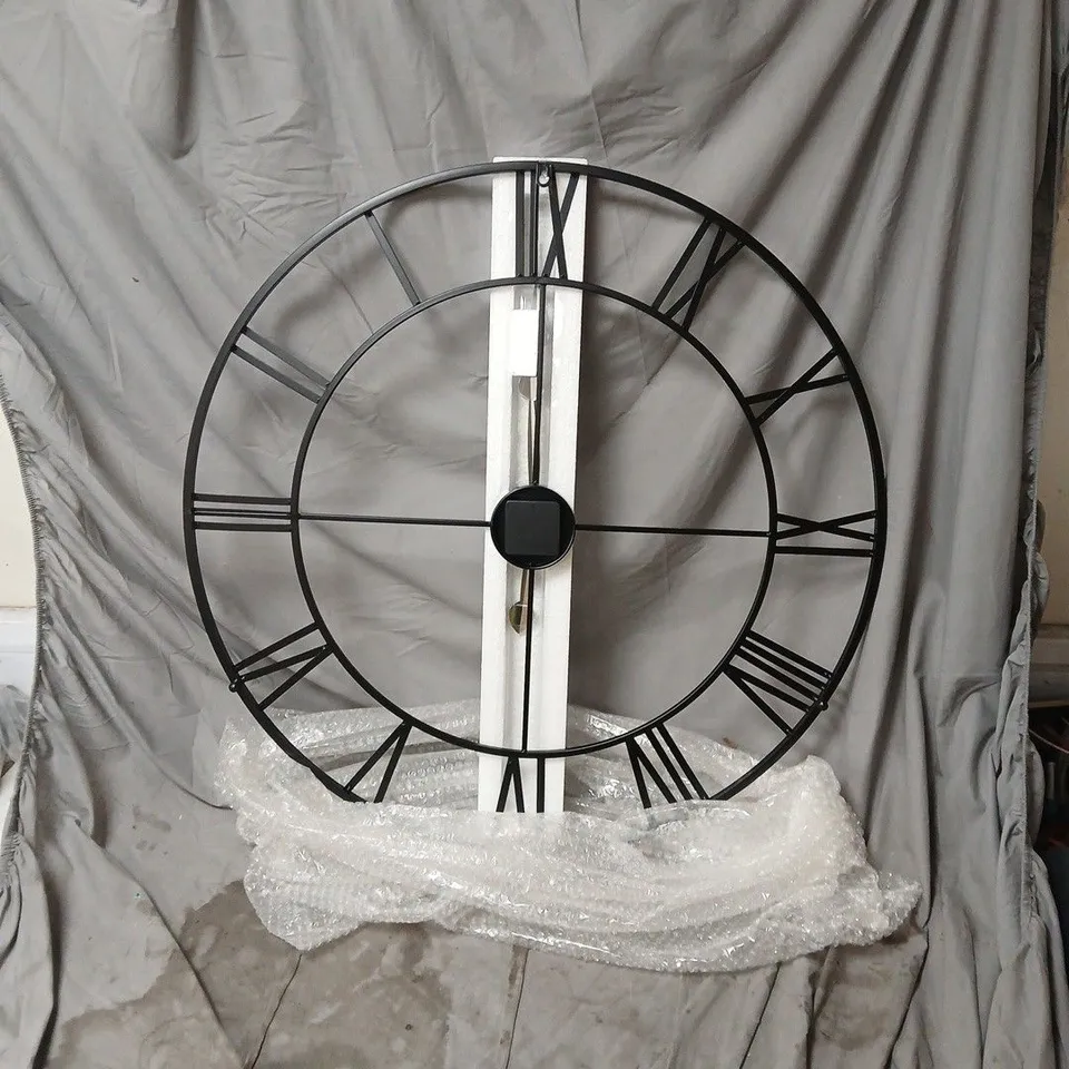 INDUSTRIAL-STYLE BLACK METAL WALL CLOCK WITH ROMAN NUMERALS - BOXED