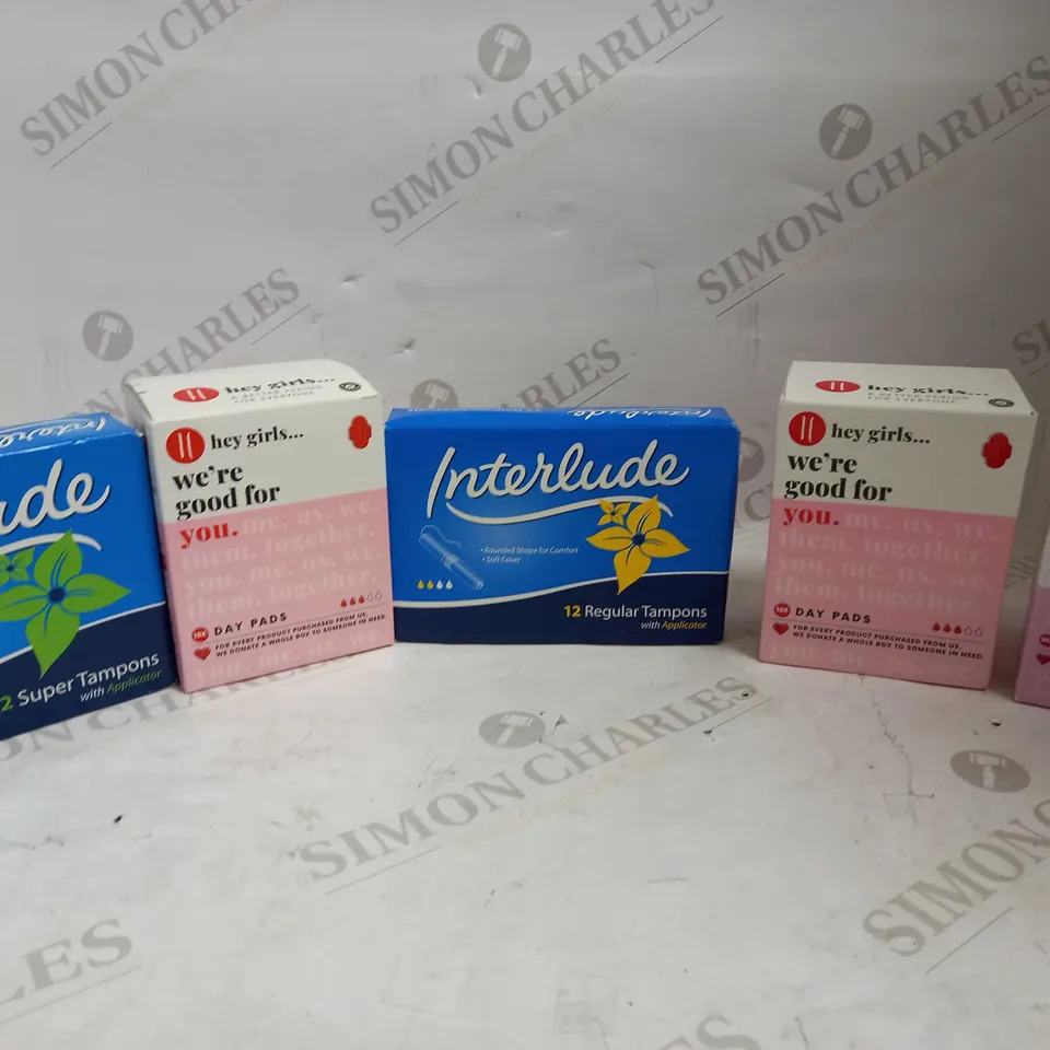 LOT OF APPROXIMATELY 18 PACKS OF ASSORTED PERIOD PRODUCTS