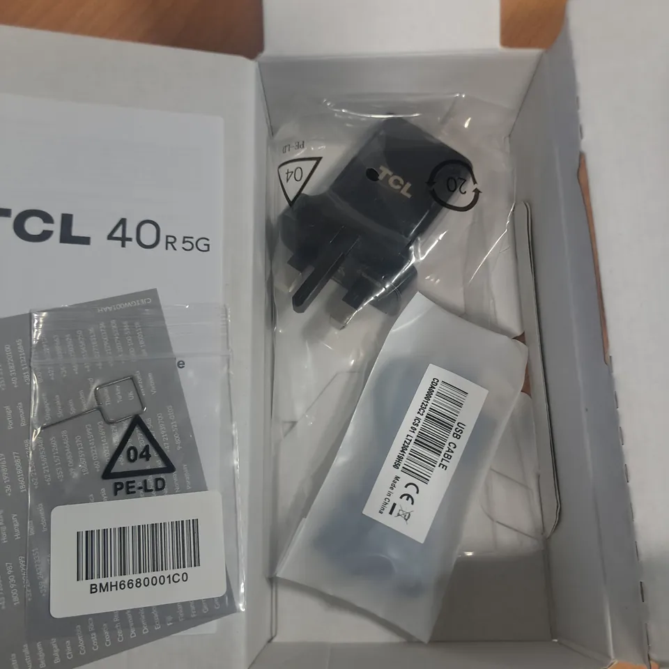 BOXED TCL 40R 5G 64GB IN STARLIGHT BLACK - T771K
