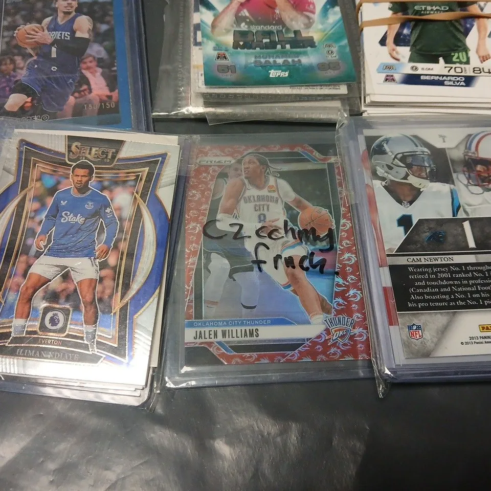 LOT OF ASSORTED SPORTS THEMED COLLECTORS CARDS