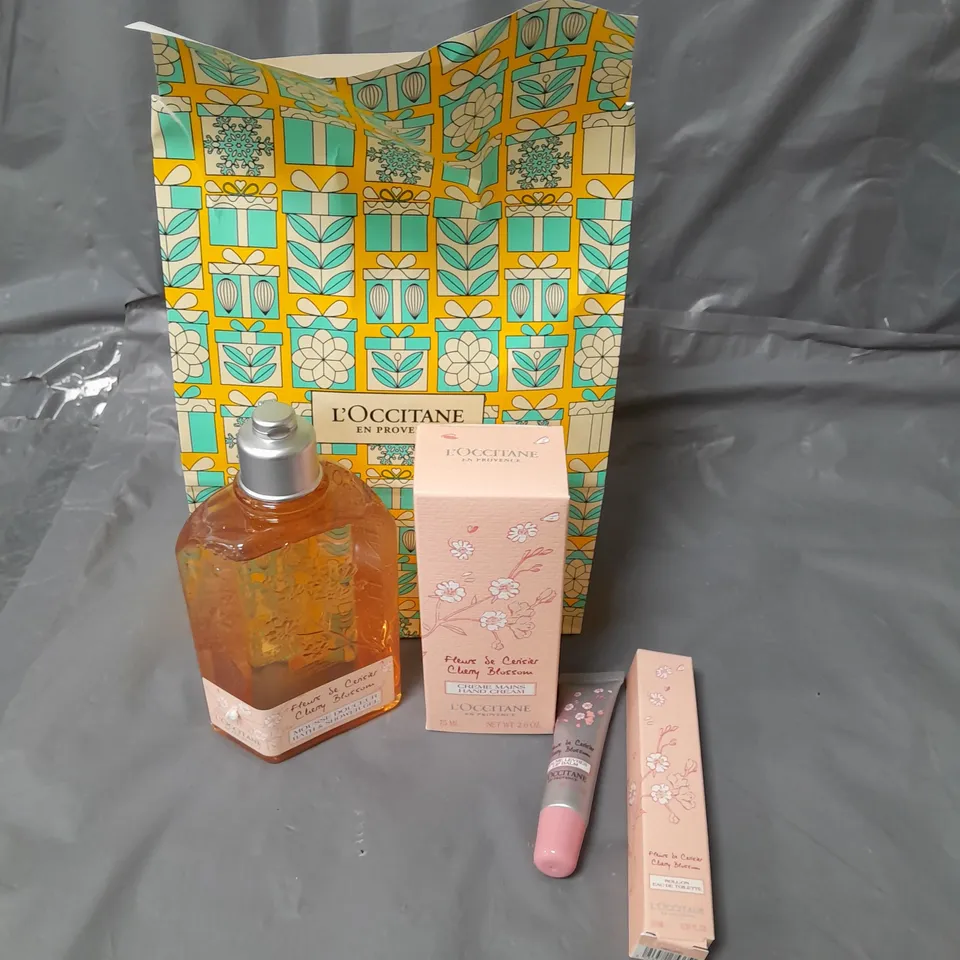 L'OCCITANE BATH AND BODY GIFT SET TO INCLUDE SHOWER GEL, LIP BALM AND HAND CREAM