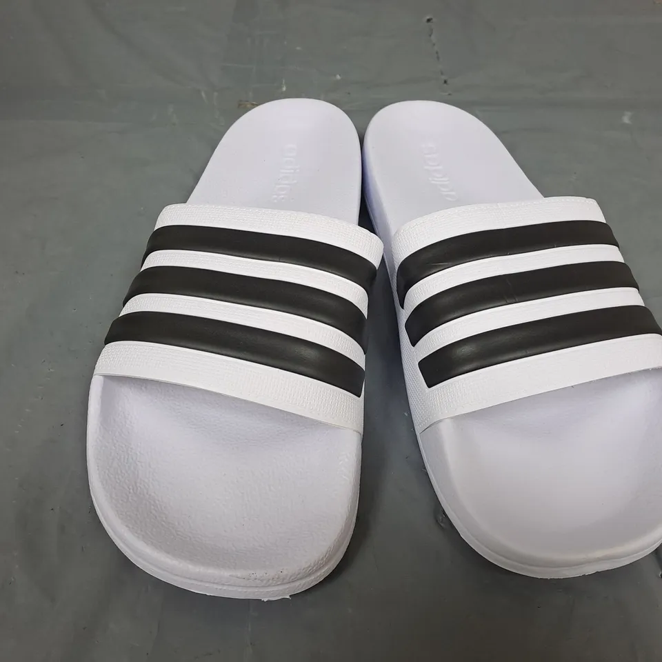 PAIR OF ADIDAS ADILETTE SHOWER SLIDES IN WHITE/BLACK - UK 10
