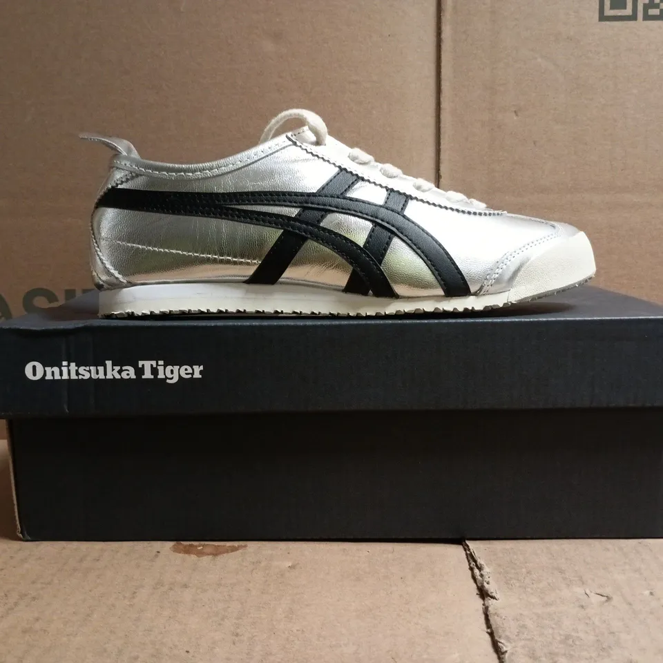BOXED PAIR OF ONITSUKA TIGER TRAINERS IN SILVER/BLACK SIZE UK 4