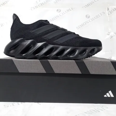 BOXED PAIR OF ADIDAS SWITCH FWD SHOES IN BLACK UK SIZE 9.5