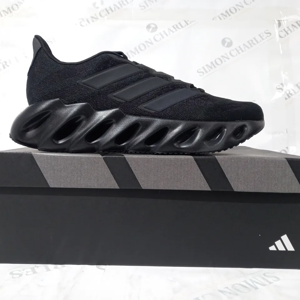 BOXED PAIR OF ADIDAS SWITCH FWD SHOES IN BLACK UK SIZE 9.5
