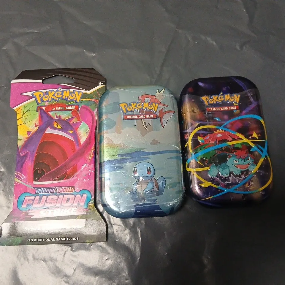 LOT OF 3 POKEMON CARD SETS INCLUDES FUSION STRIKE BOOSTER BOX AND 2 COLLECTIBLE TIN CARDS