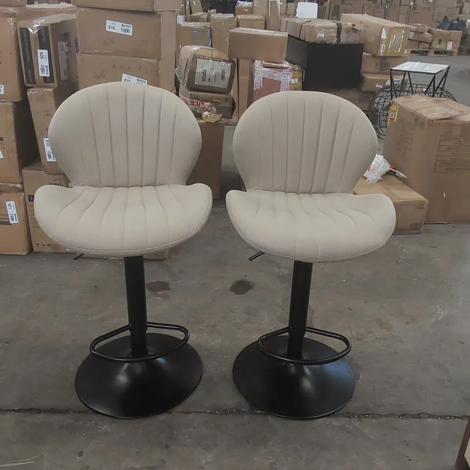 PAIR OF DESIGNER UPHOLSTERED BAR STOOLS